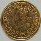 HAMMERED GOLD 1636 -1638 CHARLES I GOLD CROWN. TOWER MINT. GR.D. BUST 5. WITH FLAMING LACE COLLAR. REVERSE. OVAL CROWNED SHIELD. MM TUN. SCARCE NVF