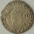CHARLES I 1634 -1635 CHARLES I SHILLING. TOWER MINT. GRD. 4TH BUST. ROUND SHIELD. MM BELL GVF