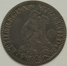 ELIZABETH I 1562  ELIZABETH I SIXPENCE. MILLED COINAGE. TALL BUST. DECORATED DRESS. SMALL ROSE. REVERSE. CROSS FOURCHEE. MM STAR.  GVF 