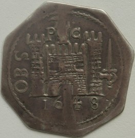 CHARLES I 1648  CHARLES I SHILLING. PONTEFRACT  BESIEGED. OCTAGONAL SHAPE. DVM: SPIRO: SPERO AROUND CROWNED CR. REVERSE. CASTLE SURROUNDED BY OBS. PC AND SWORD. DATE BELOW. VERY RARE NVF