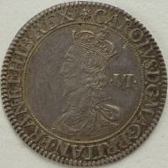 CHARLES I 1631 -1632 CHARLES I SIXPENCE. BRIOTS FIRST MILLED ISSUE. EARLY BUST WITH FALLING LACE COLLAR. REV. SQUARE TOPPED SHIELD OVER LONG CROSS FOURCHEE. MM. FLOWER AND B NEF