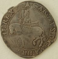 CHARLES I 1634 -1635 CHARLES I HALFCROWN. TOWER MINT. GR 3. THIRD HORSEMAN. SCARF FLYING FROM KINGS WAIST. REVERSE. OVAL GARNISHED SHIELD. MM BELL. GVF 