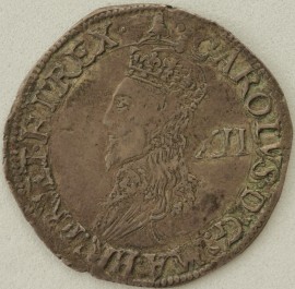 CHARLES I 1634 -1635 CHARLES I SHILLING. TOWER MINT. NO INNER CIRCLES. REVERSE. ROUND GARNISHED SHIELD. MM BELL. FULL FLAN VF