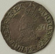 CHARLES I 1634 -1635 CHARLES I SHILLING. TOWER MINT. NO INNER CIRCLES. REVERSE. ROUND GARNISHED SHIELD. MM BELL. FULL FLAN VF