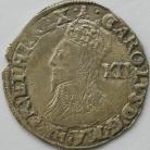 CHARLES I 1634 -1635 CHARLES I SHILLING TOWER MINT GR D 4TH BUST NO INNER CIRCLES REVERSE ROUND GARNISHED SHIELD MM BELL GVF