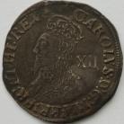 CHARLES I 1634 -1635 CHARLES I SHILLING TOWER MINT GR D NO INNER CIRCLES REVERSE ROUND GARNISHED SHIELD MM BELL - LIGHT CREASE GVF